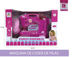 Máquina de coser de juguete en su empaque