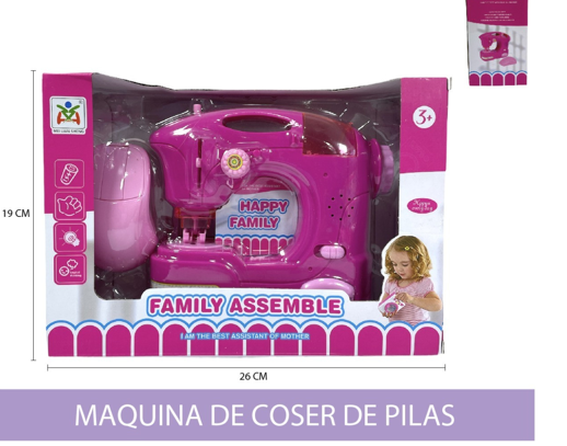 Máquina de coser de juguete en su empaque